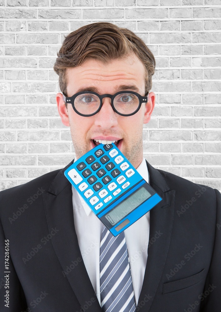 Close up of nerd man with blue calculator in mouth against white