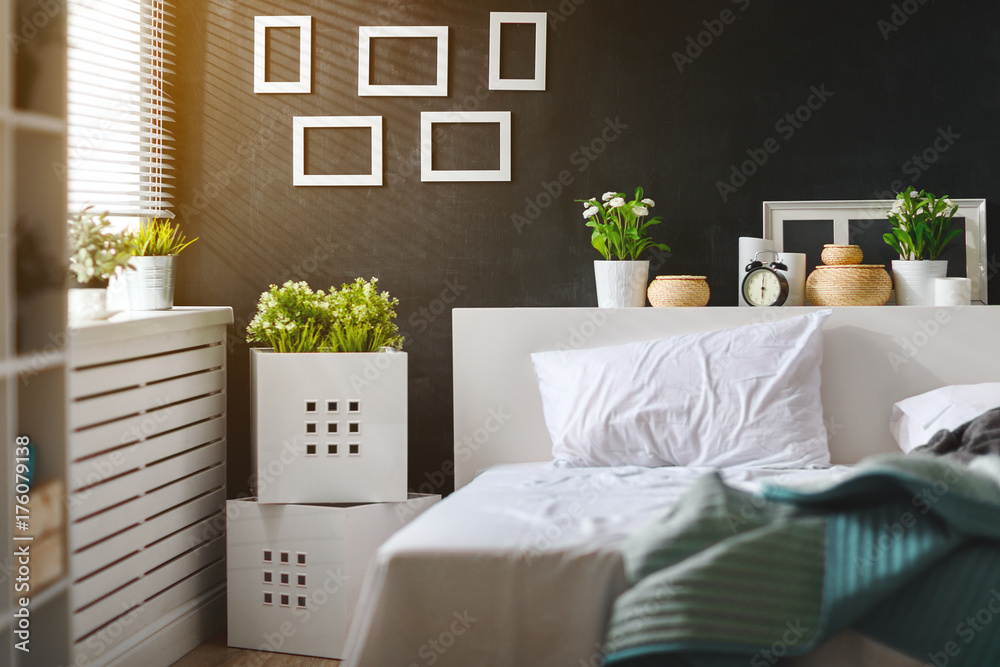 bedroom interior with bed, window and blackboard wall