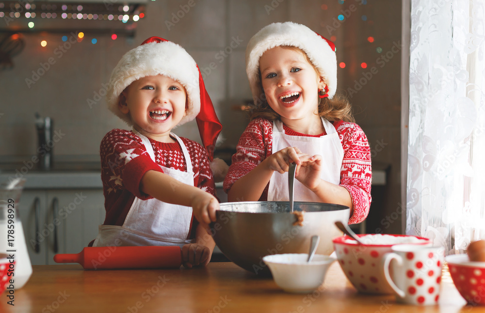 happy children bake christmas cookies