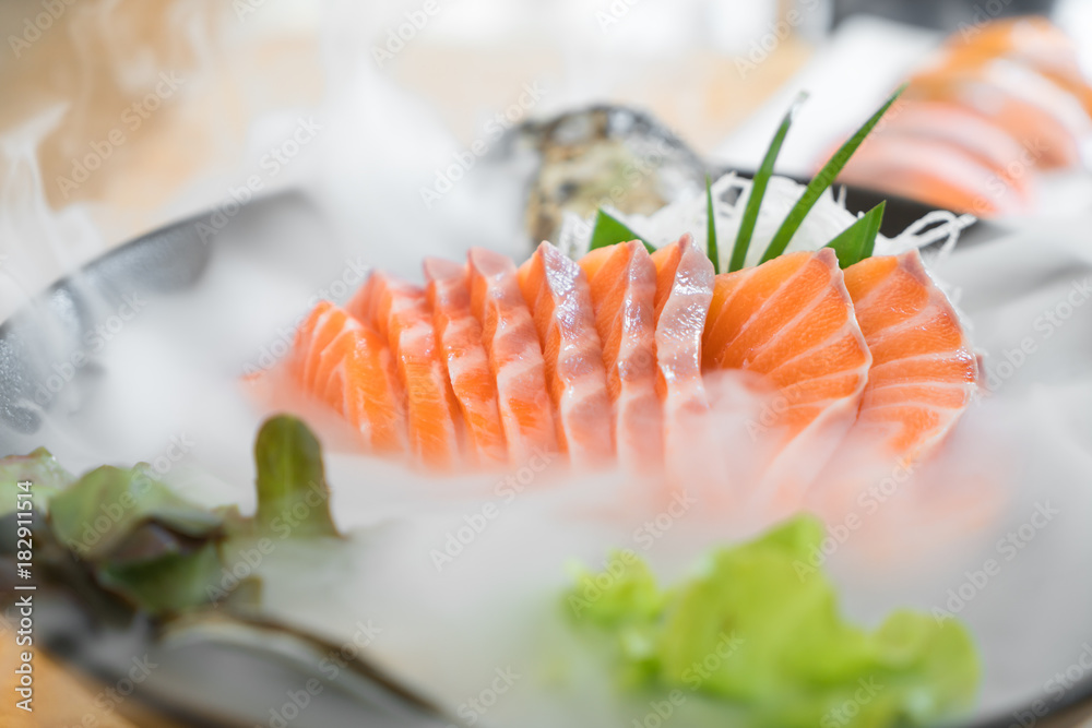 Japan raw salmon slice or salmon sashimi in Japanese style fresh serve on ice in Japanese restaurant