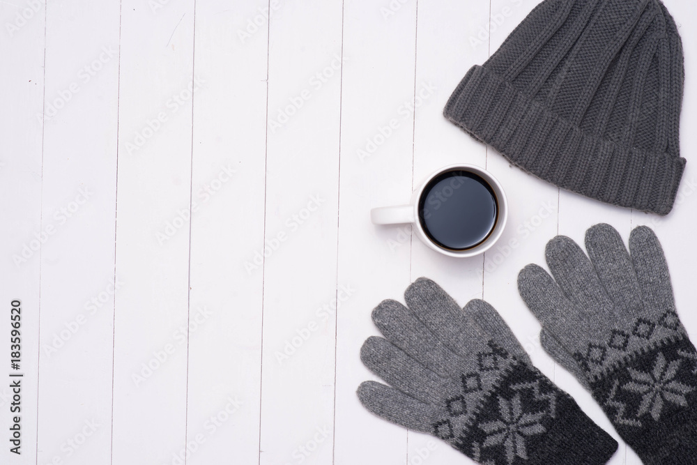 Mens winter casual outfits with coffee cup on wooden background