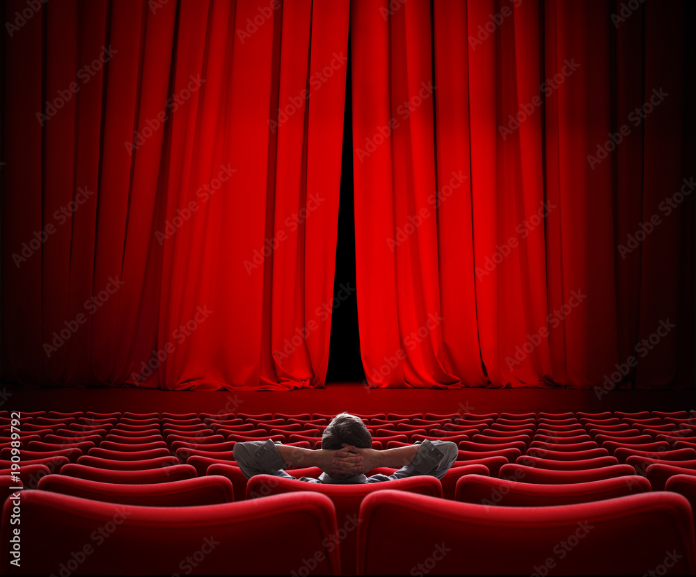 一名男子独自坐在VIP电影院大厅3d插图