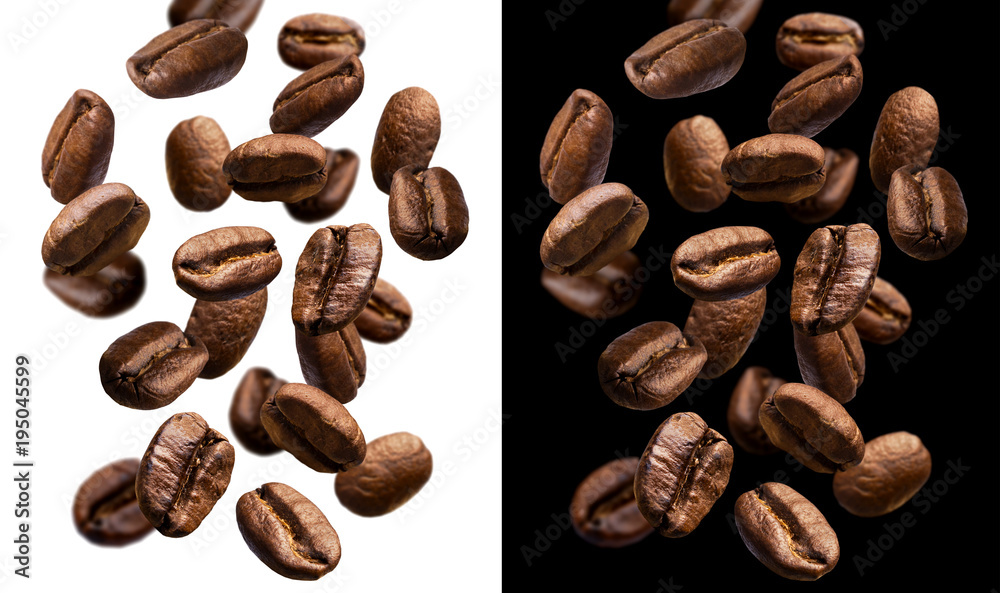 掉落的咖啡豆被隔离在白色和黑色背景上