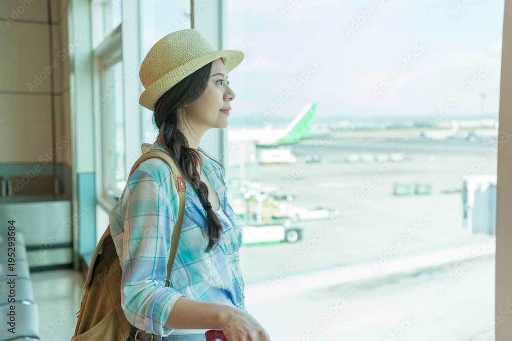 Travel business woman standing with luggage