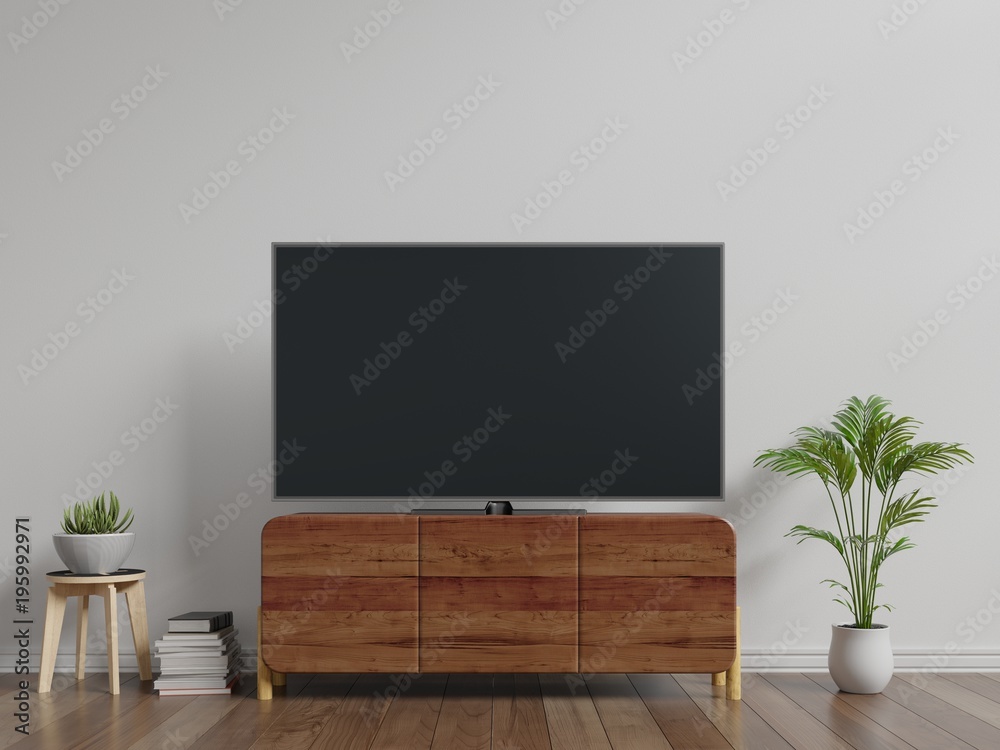 橱柜上的智能电视客厅的白墙，简约设计，3d渲染