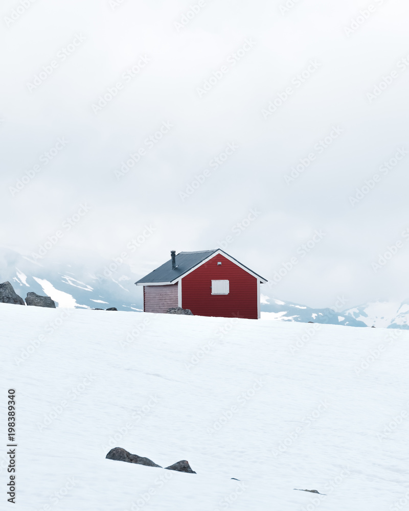 Typical norwegian red wooden house near famous Aurlandsvegen (Bjorgavegen) mountain road in Aurland,