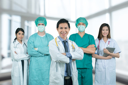 Medical team surgeon and doctor on hospital background