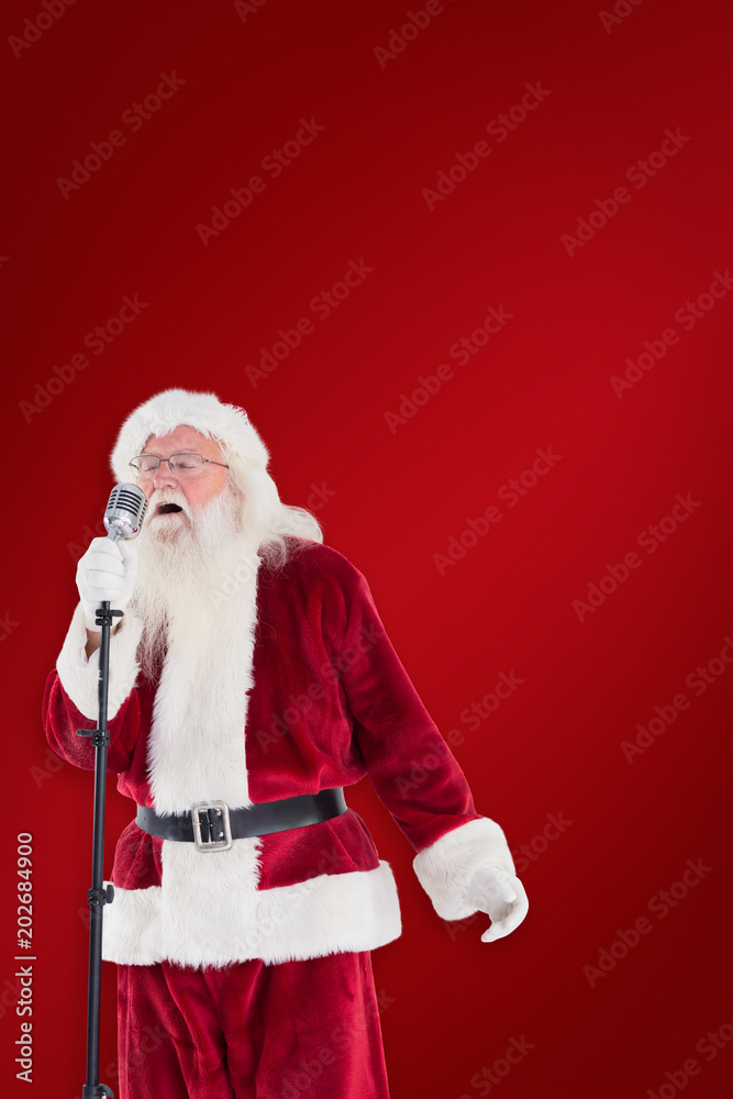 Santa sings like a Superstar against red background