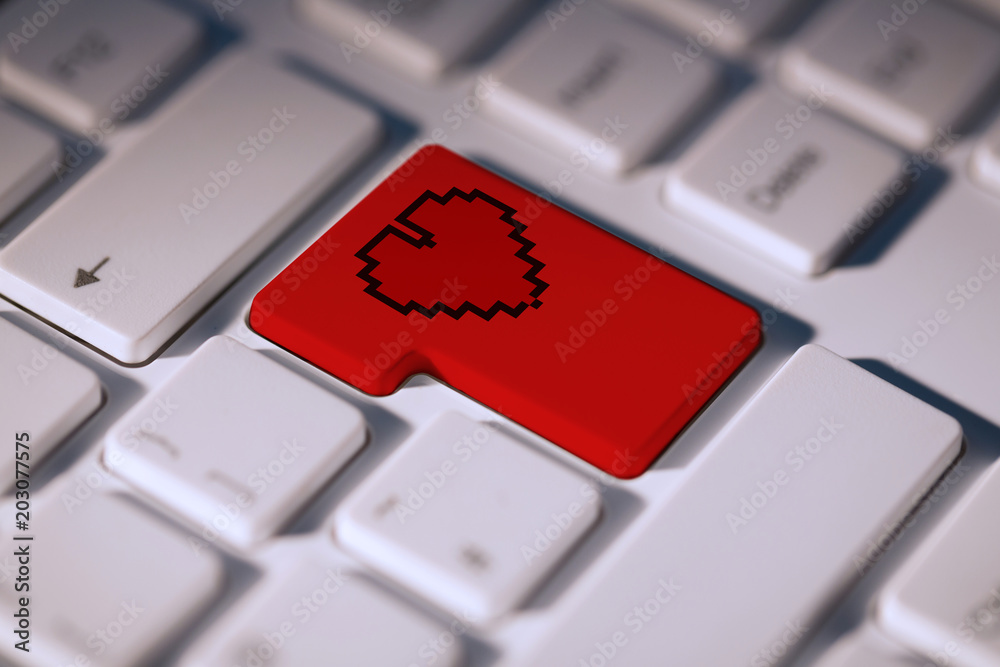 键盘上的红色按键上的心形