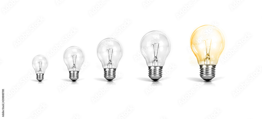白色背景下发光灯泡一次增长的灯泡，商业创造的增长成功