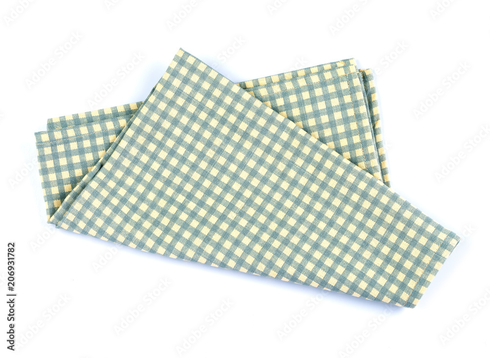 白色背景上的绿色格纹餐巾桌布。