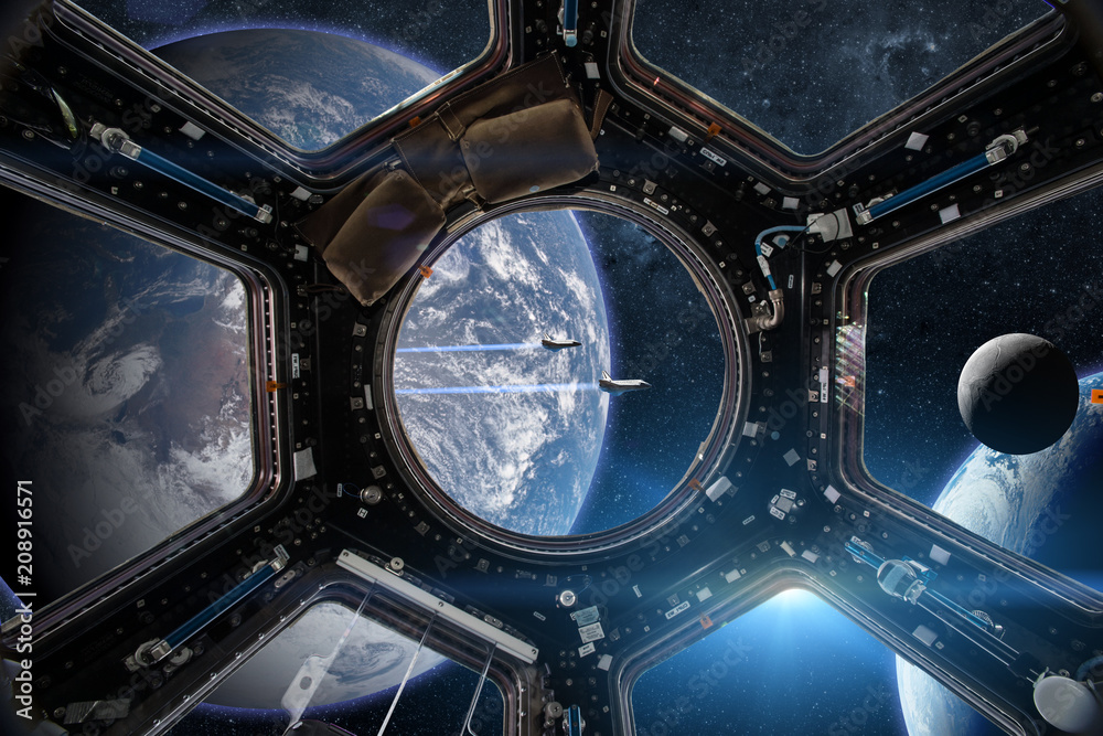 地球背景下空间站舷窗的视图。这张图像的元素由N提供