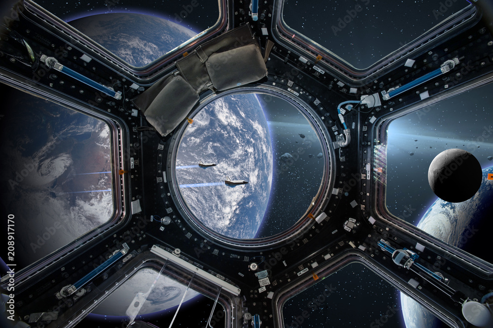 地球背景下的空间站舷窗视图。这张图像的元素由N提供