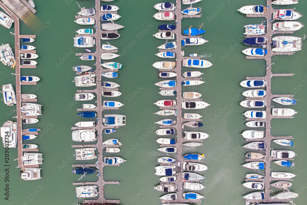 Top view of pier, Many speedboats and yachts in pier. Captured by drone