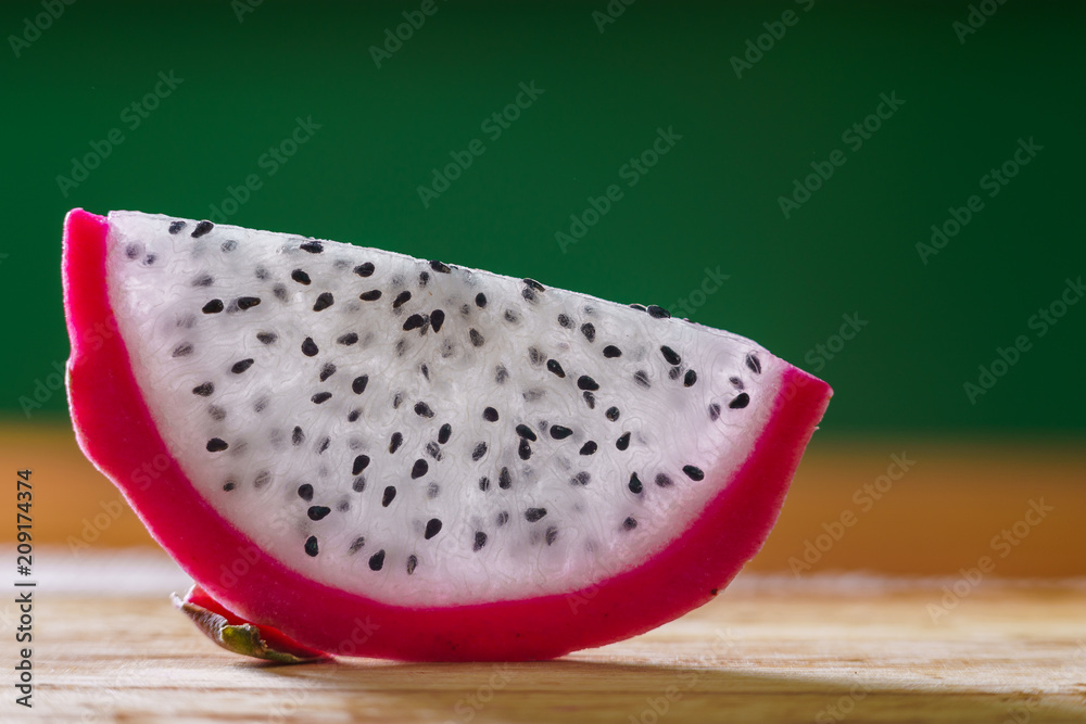 Dragon fruit in hand isolated