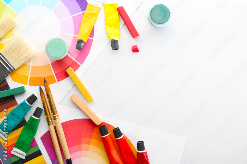 Painters supplies with color samples on white background
