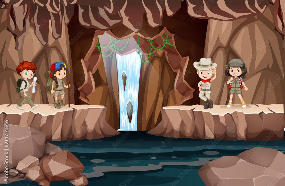 Children exploring a cave with waterfall