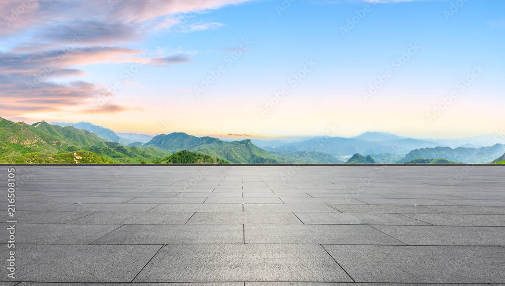 Clean square floor and mountain natural landscape at sunrise