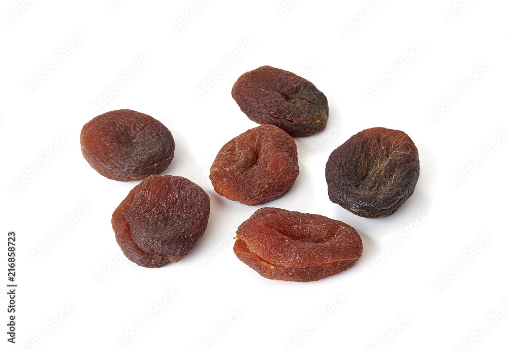 Sun dried apricots isolated on white background.
