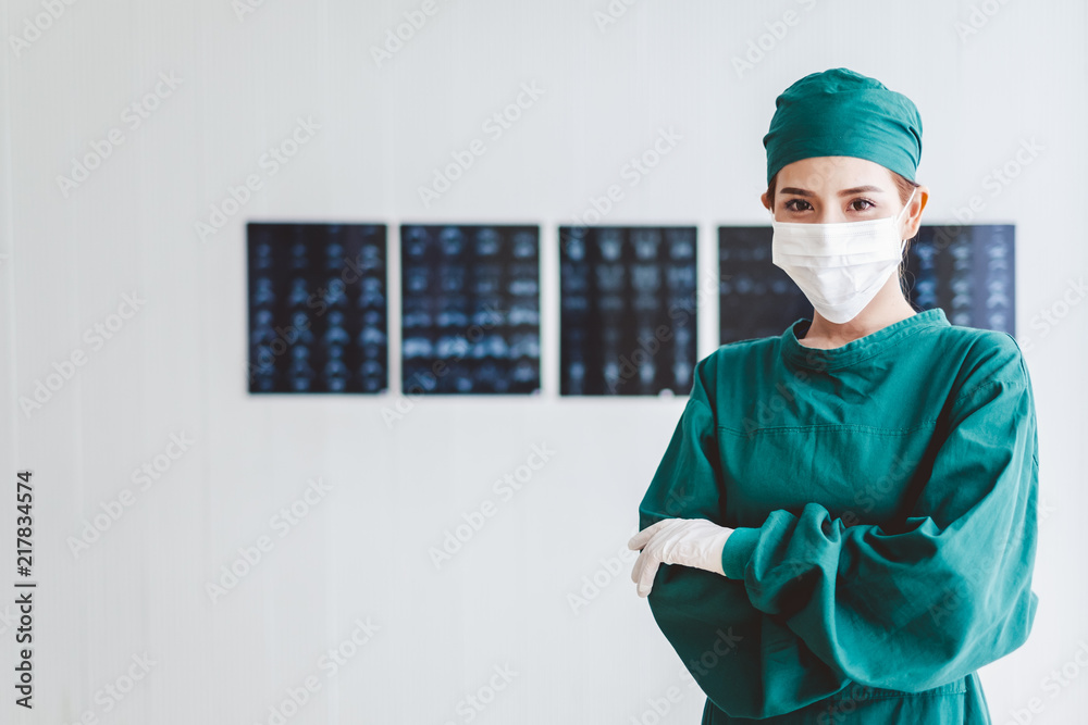 Portrait young surgeon asian doctor over radiography background, , asian medical concept
