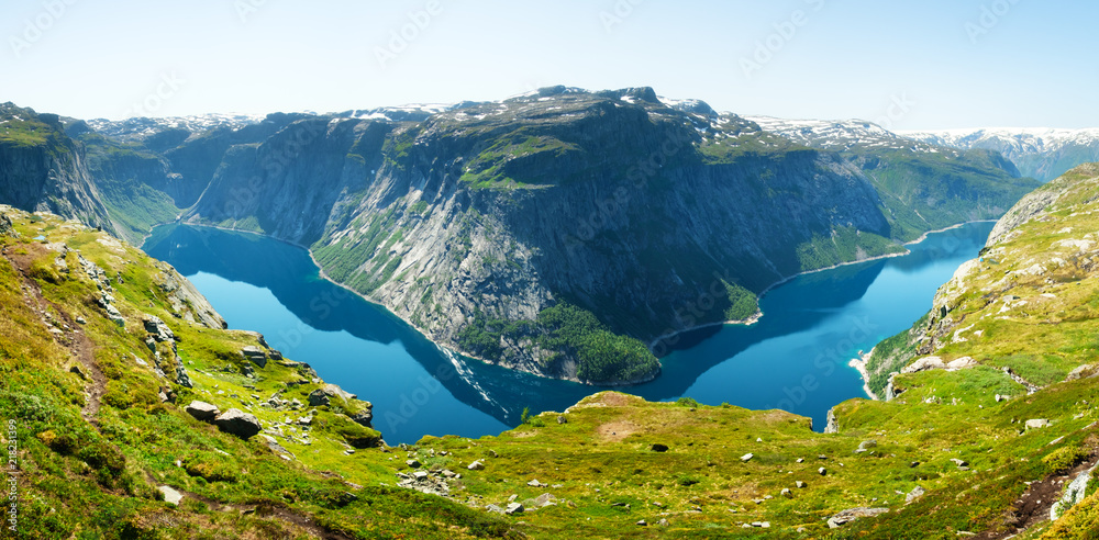 Panorama of Ringedalsvatnet lake near Trolltunga rock - most spectacular and famous scenic cliff in 