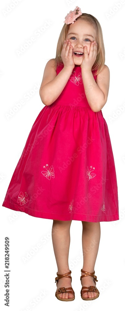穿着粉色连衣裙的可爱小女孩被隔离在白色背景下