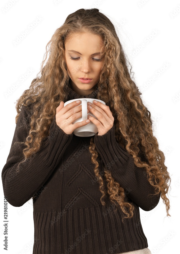 Pretty young woman holding cup of coffee isolated on white