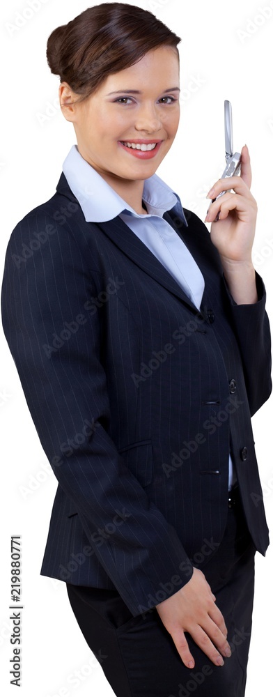 Close-up portrait of young businesswoman using mobile isolated