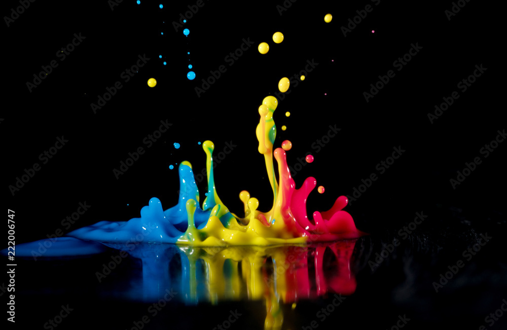 Abstract sculptures of colorful splashes of paint. Dancing liquid on a black background. Ink water s