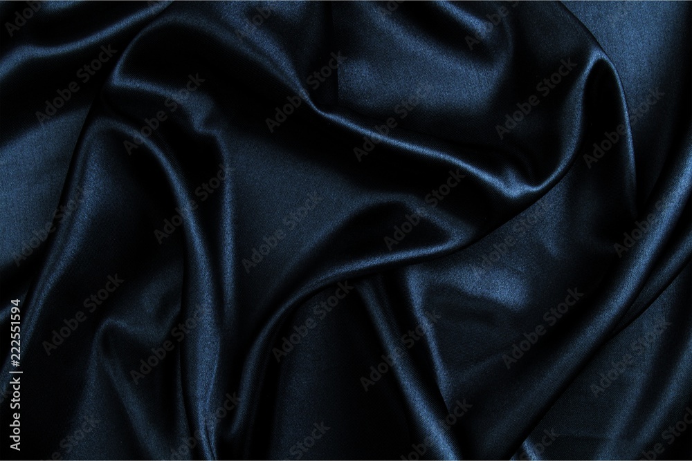 美丽的蓝色丝绸面料纹理背景