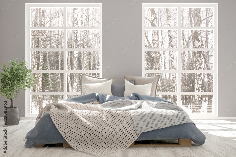 白色卧室，窗户里有冬季景观。斯堪的纳维亚室内设计。3D插图