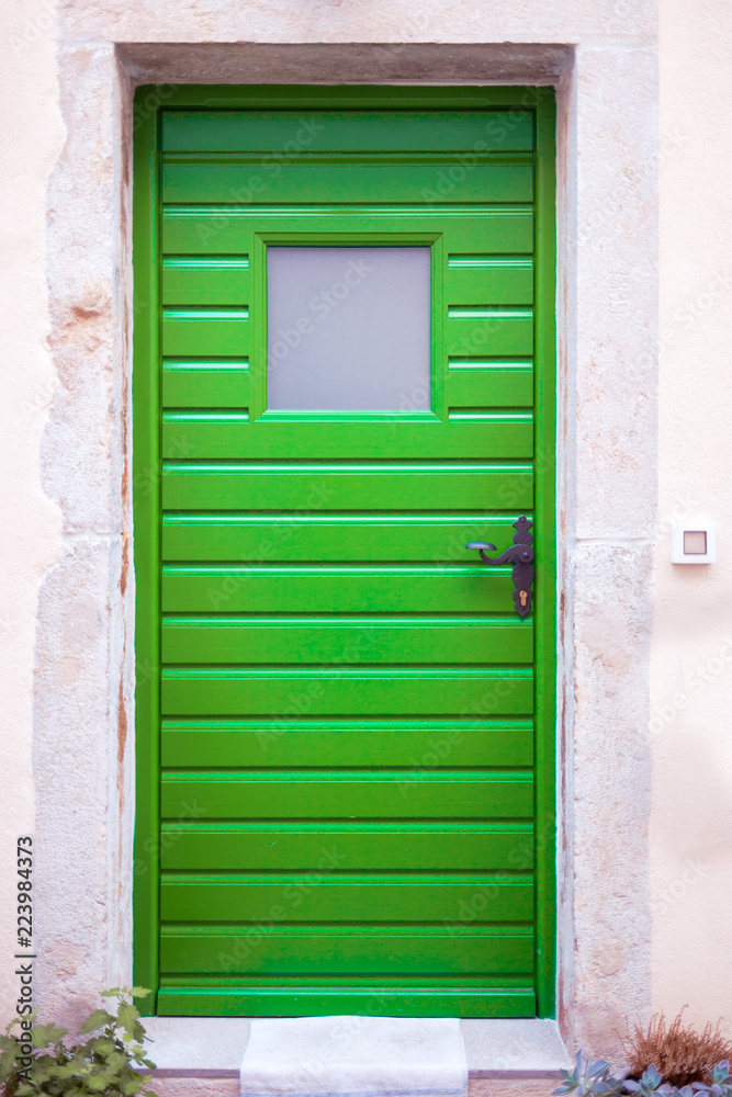 Traditional green front doors from Croatia