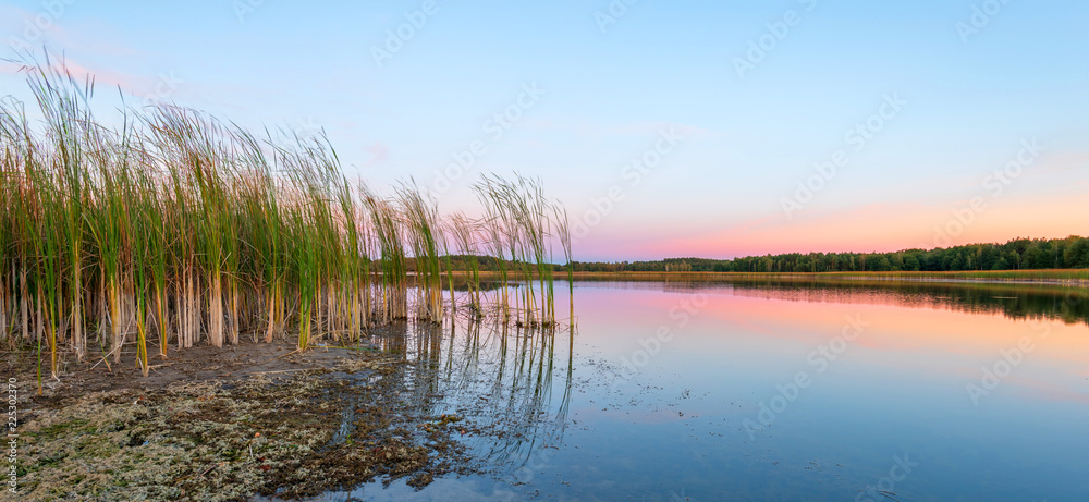 Landscape of the lake at colorful sunset