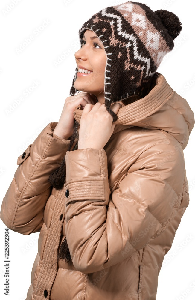 smiling young woman wearing winter outfit