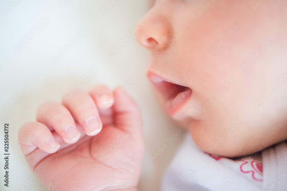 Small child with mouth open