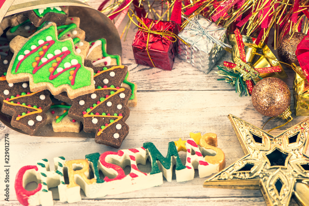 Beautiful Christmas composition and decoration with baked Christmas gingerbread cookie in paper bag 