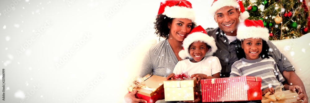 一家人拿着圣诞礼物的合成图像
