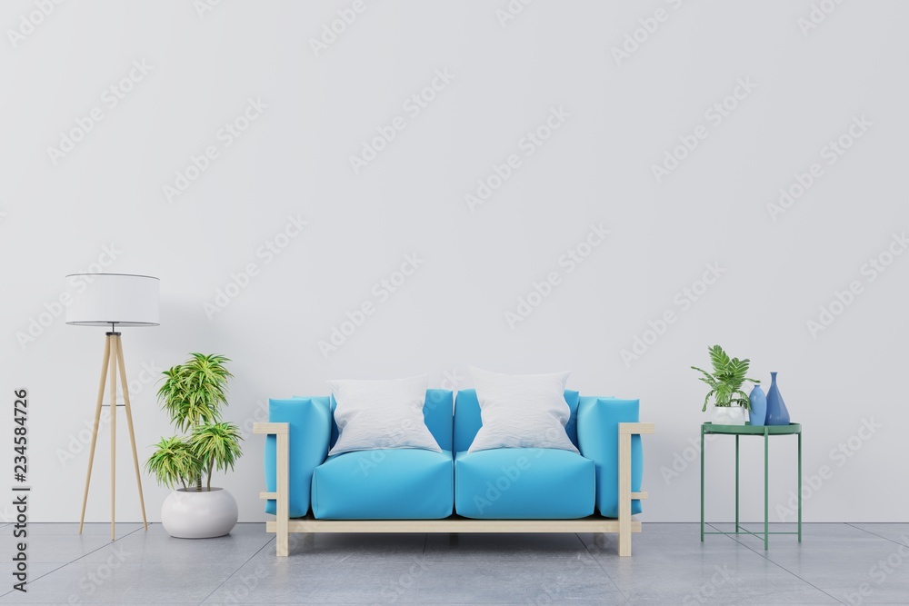 现代客厅内部，蓝色沙发和绿色植物，灯，白色墙壁背景上的桌子。3d