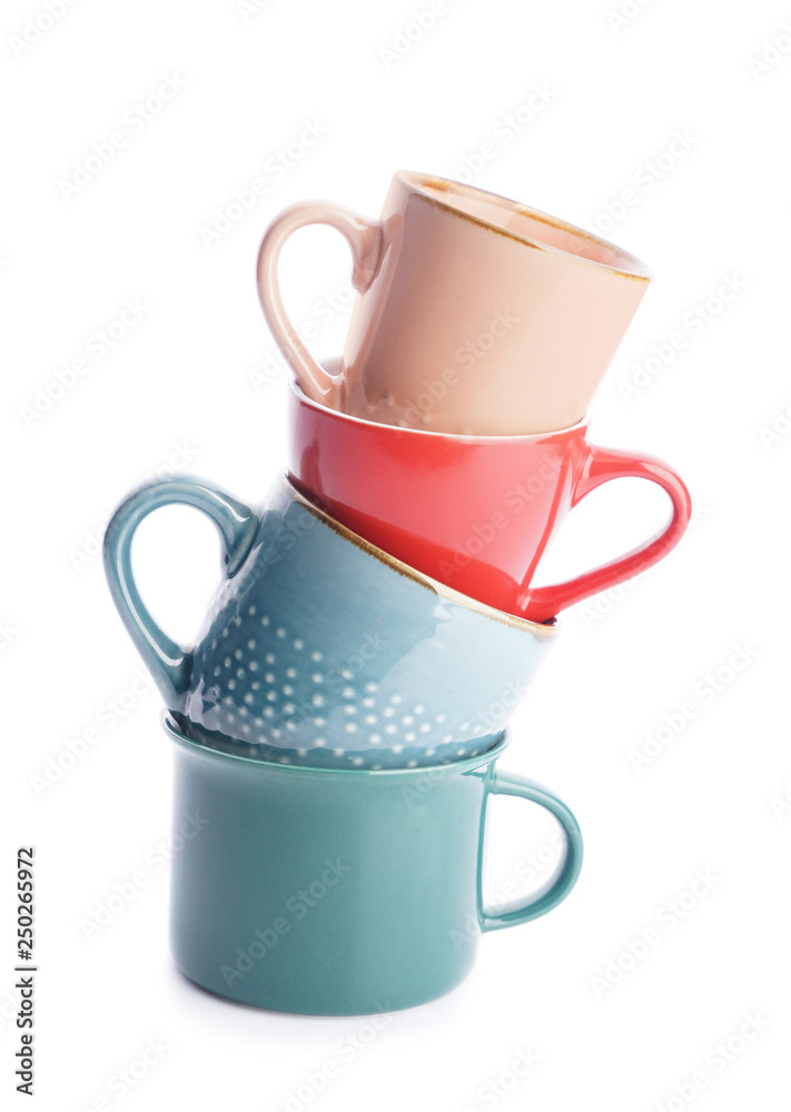 Colorful empty cups on white background