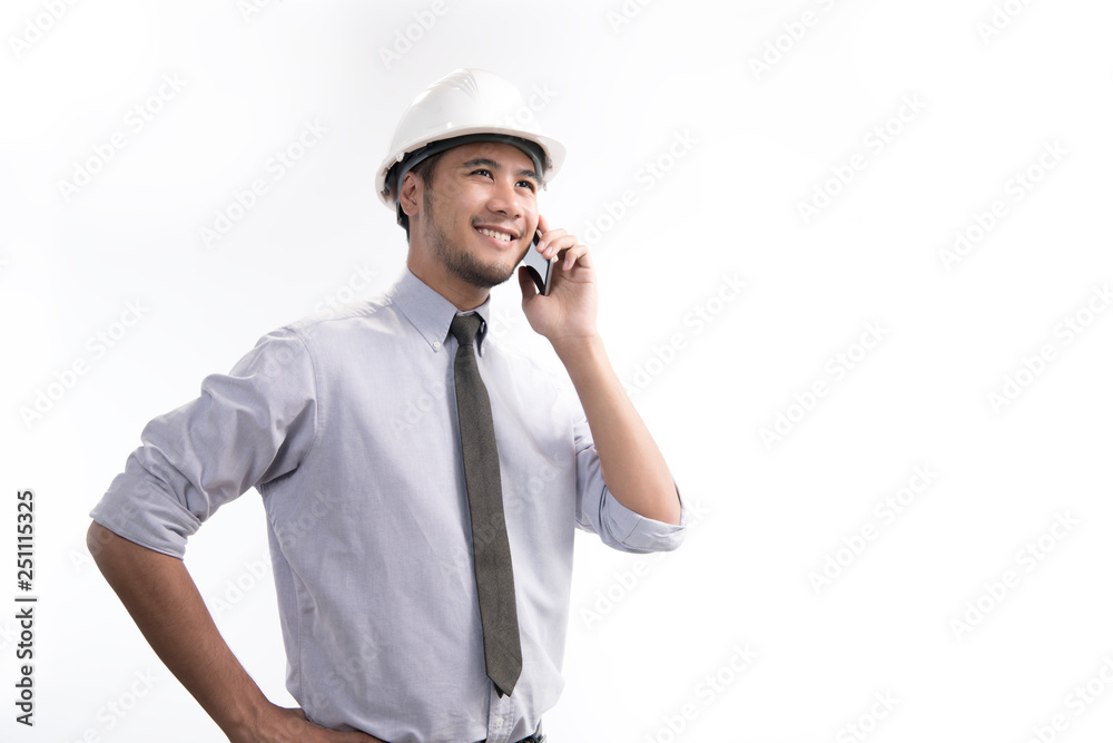 Portrait of asian engineer or architect smiling and using a cellphone isolated on white background