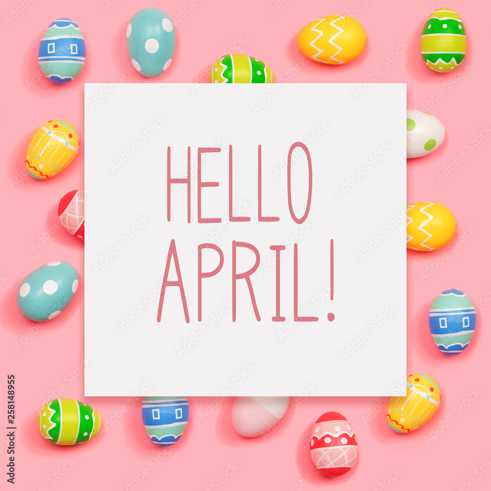 Hello April message with Easter eggs on a pink background