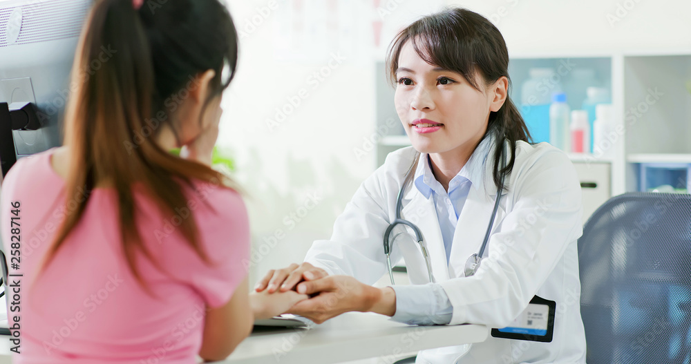 female doctor console patient