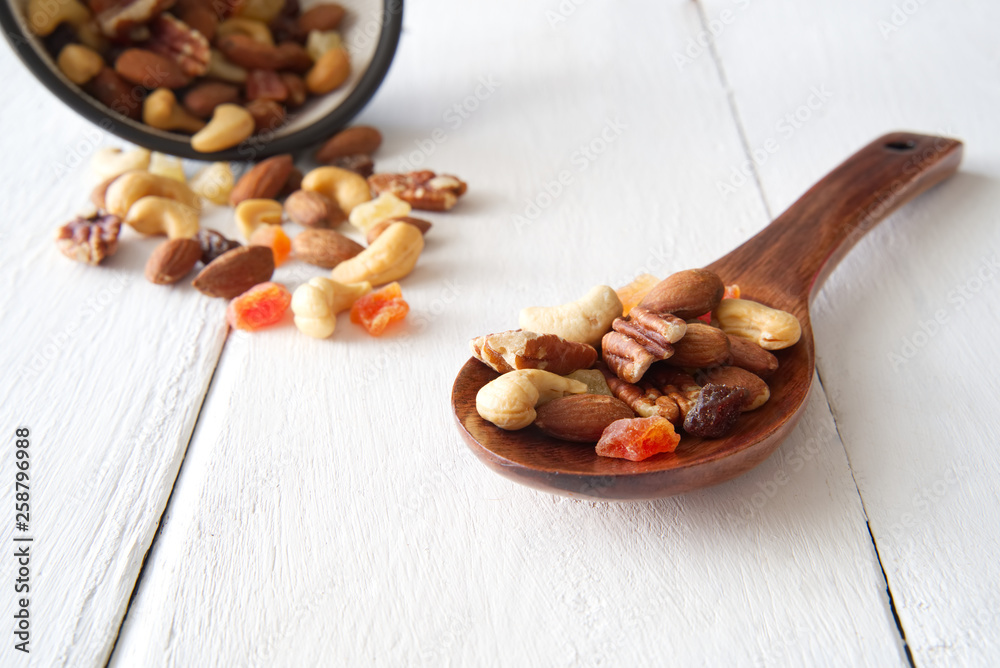 Mix nuts and dried fruits background and wallpaper. Seen from side view of mix nuts and dried fruits
