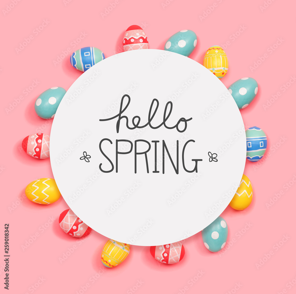 Hello spring message with round frame of Easter eggs