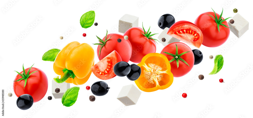 Falling greek salad isolated on white background with clipping path, flying fresh vegetable salad in