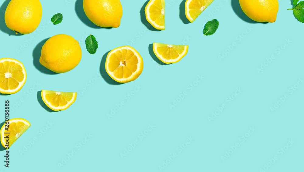 明亮颜色背景上的新鲜柠檬图案平铺