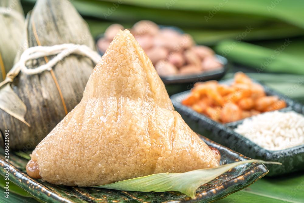 Close up, copy space, famous chinese food in dragon boat (duan wu) festival, steamed rice dumplings 