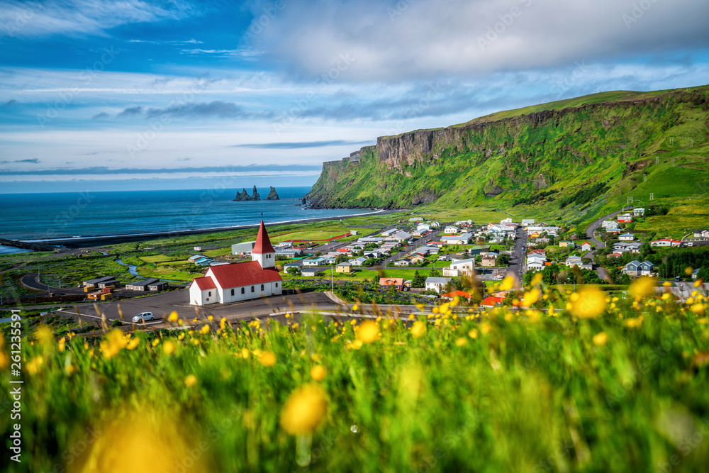 Beautiful town of Vik i Myrdal in Iceland in summer. The village of Vik  is the southernmost village