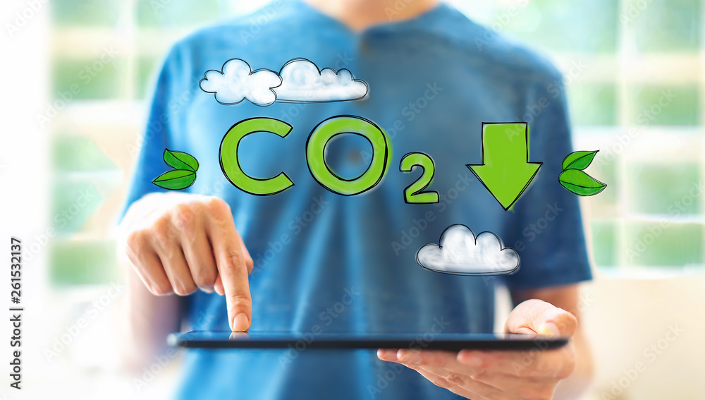 Reduce CO2 with young man using a tablet computer