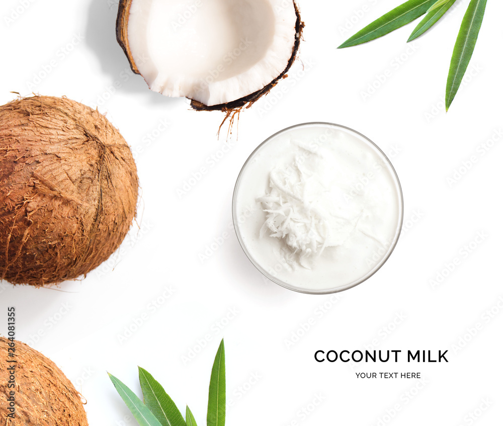 白色背景下由椰子和椰奶制成的创意布局。平面布局。食品概念。宏观